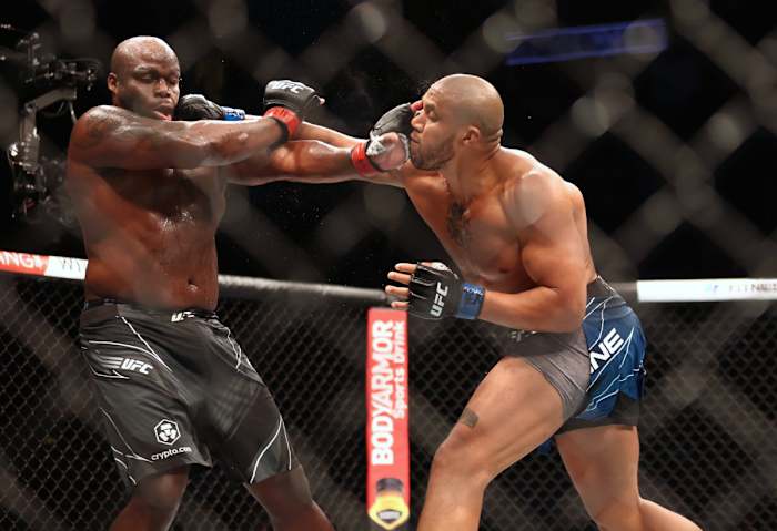 Ciryl Gane (r.) defeats Derrick Lewis at UFC 265 on Aug. 7, 2021.